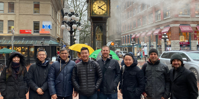 Maple members, alumni and Launch team in front of the famous Gastown Steam Clock.